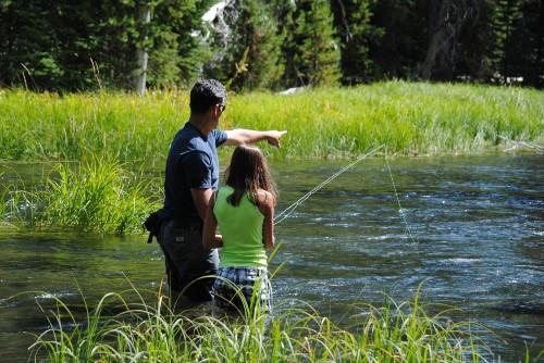 Dr. Hughes and his daughter fishing. 