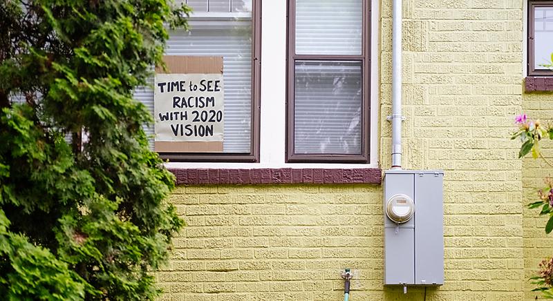 Anti-racism sign in window